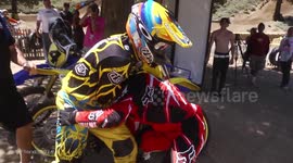 Ryan Hughes and Michael Lapaglia fight after clashing during Mammoth Motocross