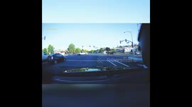 Pedestrian barely avoids being struck by reckless driver.