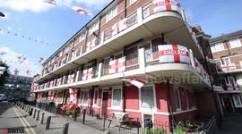 One London street is urging on the England team in the World Cup with a massive display of the national flag