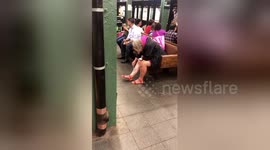 Woman shaves legs on New York subway