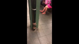 Woman Preps Leg for Shaving in NYC Subway 01