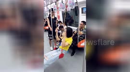 Chinese woman brings own 'swing seat' on train
