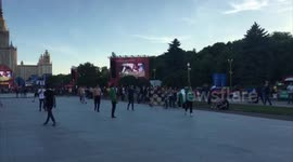 Football fans enjoy a match of 'Shirts v Skins' at the Moscow fan park