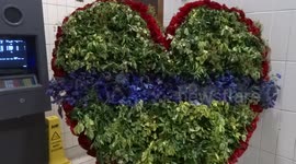 Floral heart for Grenfell at Ladbroke Grove tube station