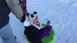 The joys of that first trip down the hill on a sled!