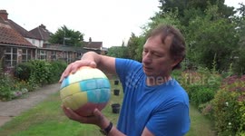 Man makes Rubik's Cube football to mark World Cup