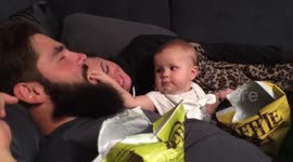 Funny moment where baby is feeding daddy! Role Reversal!