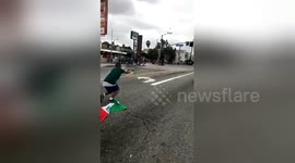 Man arrested on suspicion of launching firework as World Cup celebrations in east LA turn violent