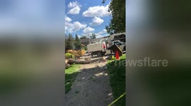 Man struck and injured by tree just as it was cut down