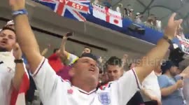 England supporters celebrate victory in stands of Volgograd Arena