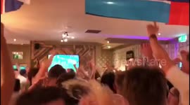 England fans erupt into cheers as Harry Kane scores last-minute goal to beat Tunisia