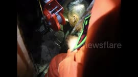 Hero fireman squeezes into septic tank to rescue trapped children