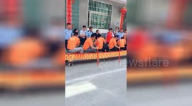 Chinese dragon boaters race on dry land