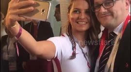 Anna Lewandowska poses for selfies at the World Cup