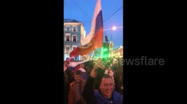 Russia fans celebrate on St. Petersburg streets after victory against Egypt