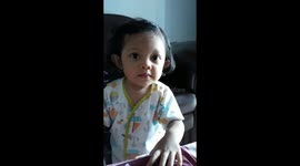 11 month old baby is good at imitating the nature of his family