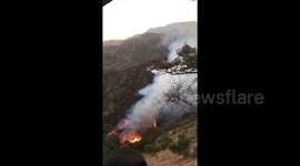 Firefighting helicopters arrive on the site of Hollywood attraction blaze