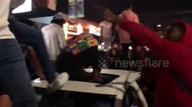 XXXTentacion fans jump on top of car at impromptu LA memorial shut down by police PART 1