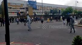Protesters hurl missiles at police after death of Rashan Charles