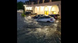 Cars float through floodwaters in parking lot as state of emergency issued in Pittsburgh
