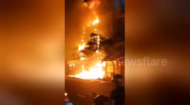 Five-story building gutted by fire in just minutes