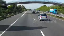 Dashcam captures driver suddenly swerving across three lanes