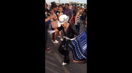 Elderly man dances very enthusiastically at Coney Island music festival