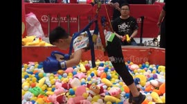 Now children in China can become human claw machines at the local mall
