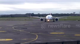 Emirates Boeing 777 coming onto stand in Dublin airport