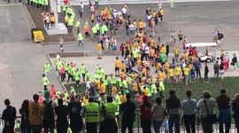 Australian hooligans breaking through security barrier