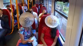 Variety of Ascot hats on the train from Richmond to Ascot
