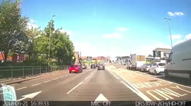 There is late and then there is still late. Car drives through red light