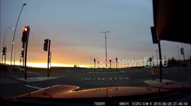 BLEEPED: Heart-stopping dash-cam video shows red light runner's amazing near miss