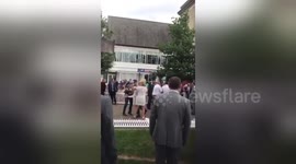 Bare-chested race-goer challenges punter on Ladies' Day at Royal Ascot