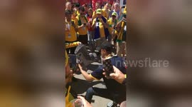 Australian fan performs ‘shoey’ from moon boot after Socceroos draw with Denmark