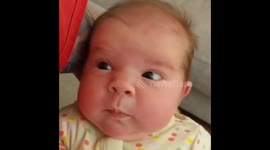 Newborn girl confused by her first sneeze