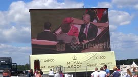 HM The Queen and the Duke of York on digital screen during the Royal carriage procession on Ladies Day at the Royal Ascot 2018