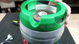 YouTuber creates DIY BBQ out of Heineken beer keg