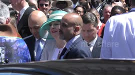 Theresa May leaving the Windrush 70th Anniversary at Westminster Abbey, London, UK