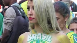 Woman dances in Rio de Janeiro during World Cup match