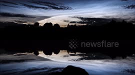 Beautiful Noctilucent Clouds Over Lake - Time Lapse