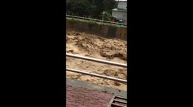 Flooding into small towns in northern Vietnam