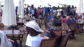 Hats and umbrellas at Royal Ascot 2018 Ladies Day