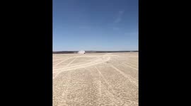 Lamborghini speeding in the dust