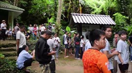 Rescuers search for 12 children trapped in Thai cave