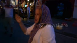 'The Queen' parades around Nizhny Novgorod after England win as fans sing
