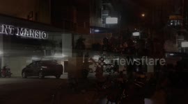 Australian held for questioning after girlfriend falls from balcony