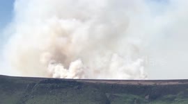 Large moor fire sends plume of smoke into skies over Saddleworth