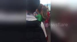 Newsflare Edit - Iran fans chant 'Ronaldo bye' as team bus leaves hotel in Saransk