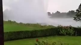 Huge waterspout tears through garden in Germany
